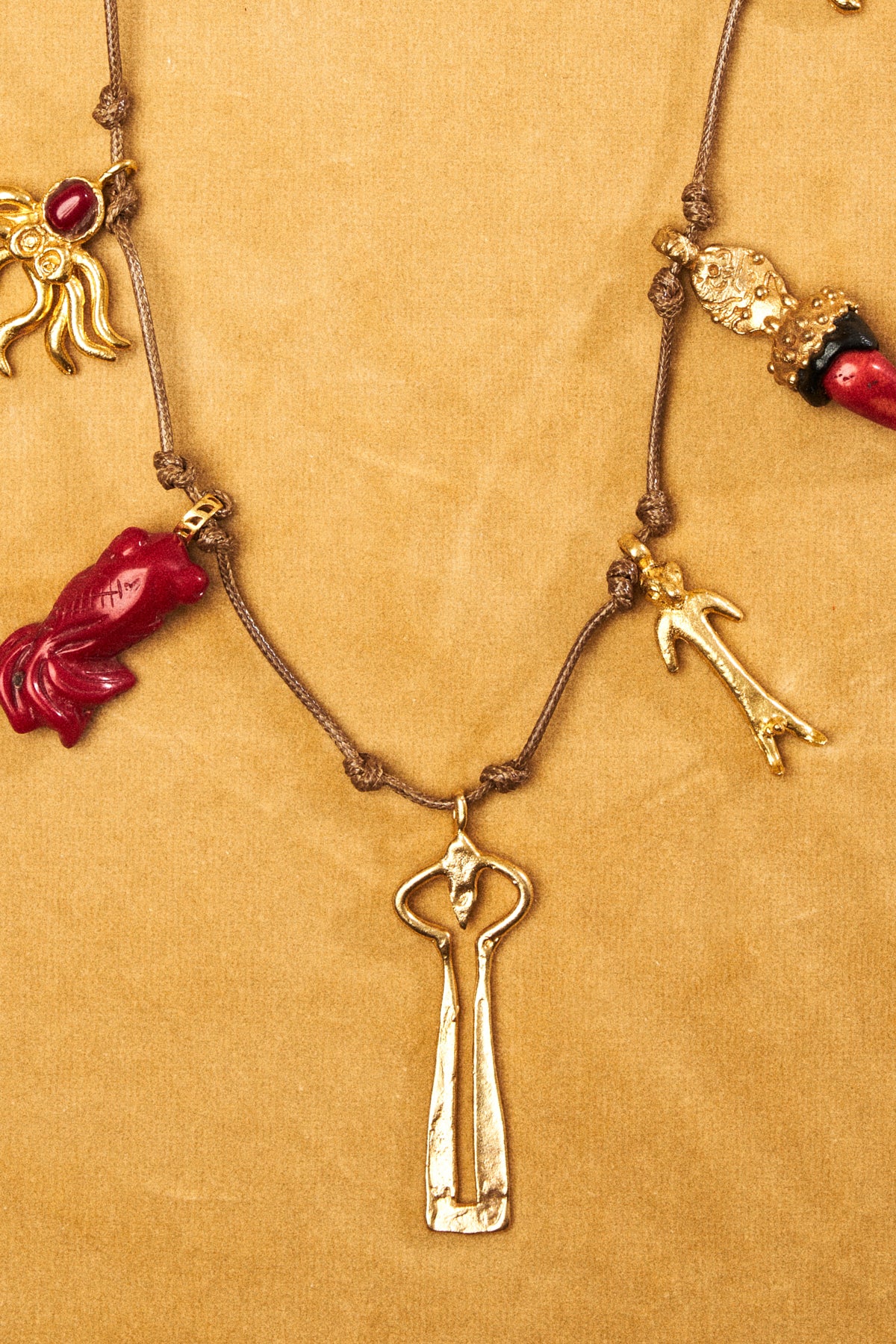 Charms Necklace on Leather Cord